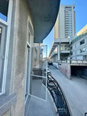 a balcony of a building with a view of a street at Dream in Varna City