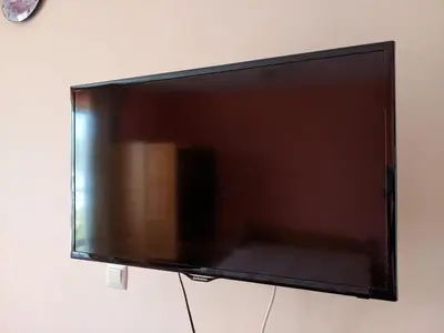 a flat screen tv hanging on a wall at Studio Fatinia in Byala