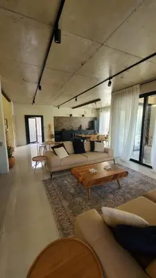 a large living room with couches and a table at Luxury Villas Giardino Lozenetz in Lozenets