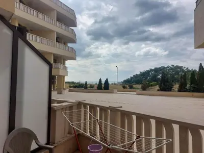 a shopping basket on the balcony of a building at Studio Sarafovo in Burgas City