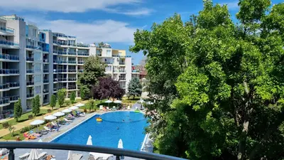 arial view of a swimming pool in a resort at Oasis deluxe apartment by the sea in Ravda