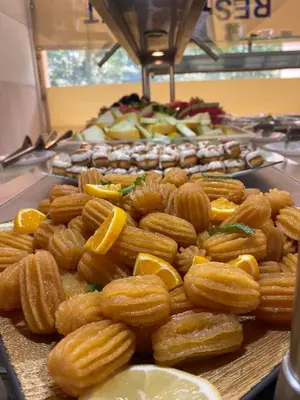 a pile of pretzels sitting on a table at Moreto Seaside Aparthotel in Obzor