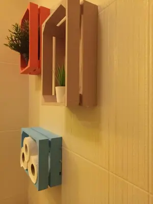 a bathroom with a toilet paper dispenser on a wall at APARTMENT STUDIO DELUXE MARINA CAPE 4 stars resort 33 5 in Aheloy