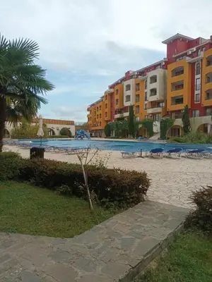 a resort with a swimming pool and some buildings at APARTMENT STUDIO DELUXE MARINA CAPE 4 stars resort 33 5 in Aheloy