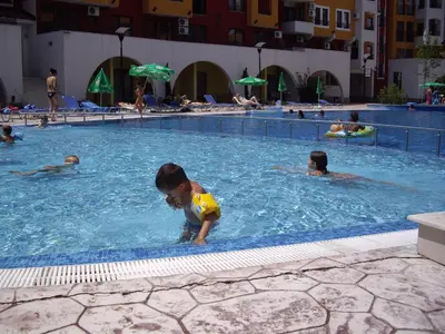 a group of people swimming in a swimming pool at APARTMENT STUDIO DELUXE MARINA CAPE 4 stars resort 33 5 in Aheloy