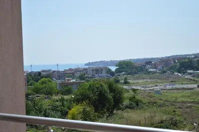 a view of a city from a balcony at Hotel Ray in Sozopol