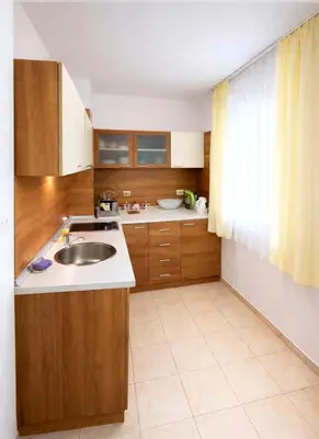 a kitchen with a sink and a counter top at Sunset Dream Polo Resort in Sunny Beach