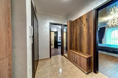 a hallway of a home with a door and a room at Luxe Apartment Olymp in Sveti Vlas in Sveti Vlas