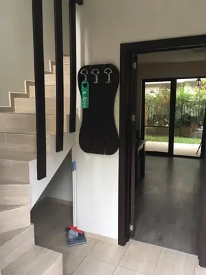 a room with a guitar hanging on the wall at The White Houses Complex in Nesebar