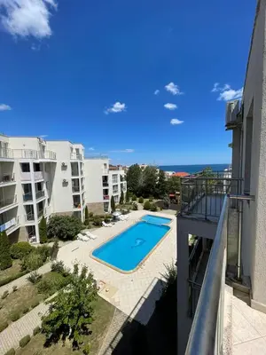 a view of a swimming pool from a balcony of a building at Atlantik-Byala SP apartments in Byala