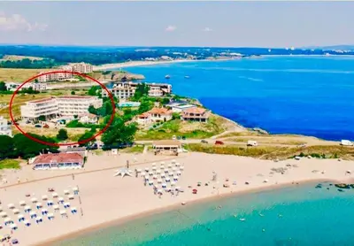 an aerial view of a beach with a roller coaster at Perla Del Mar Studio PANORAMA First line in Lozenets