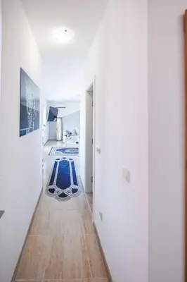 a hallway with a swimming pool in a house at LifeStyle 6 in Sunny Beach