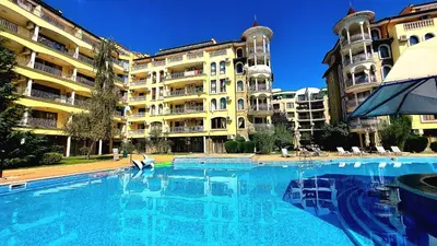 a large swimming pool in front of a building at Summer Dreams - Menada Apartments in Sunny Beach