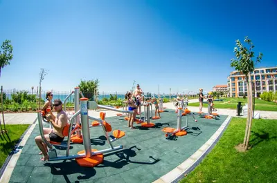 a group of people playing on a playground at Premier Fort Beach Resort in Sunny Beach