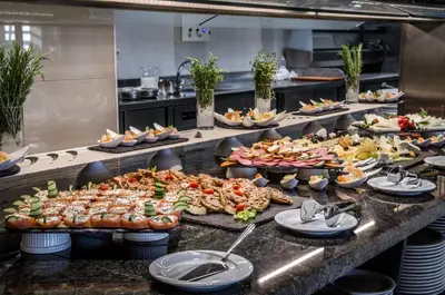 a buffet line with many different types of food at Premier Fort Beach Resort in Sunny Beach