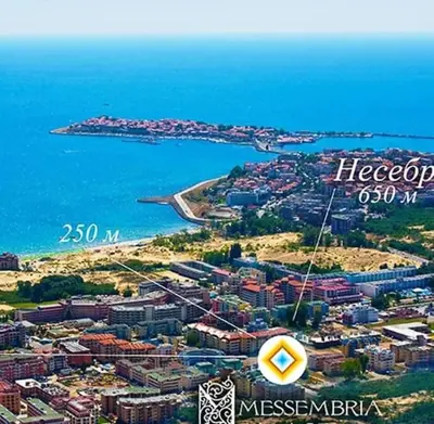 an aerial view of a city next to the ocean at Messembria Resort in Sunny Beach