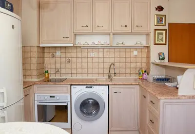 a kitchen with a washing machine and a dishwasher at Cozy 1BD Apartment with Free Parking in the Area by Flat Mаnager in Varna City