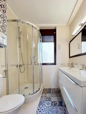 a bathroom with a shower and a toilet and a sink at Dolce Vita Blue Boho, Premium Apartment with seaview in Sveti Vlas