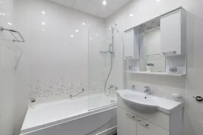 a bathroom with a sink and a shower and a tub at Infinity View Shkorpilovci in Shkorpilovtsi