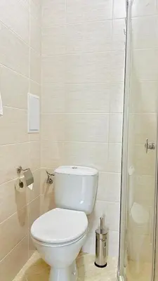 a bathroom with a toilet and a shower at Attractive Family Apartment in Sunny Beach Cascadas Family Resort in Sunny Beach