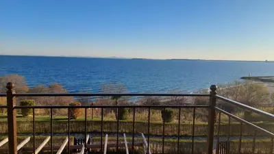 a view of the water from a balcony at Monastery II Garden stay like home in Sveti Vlas