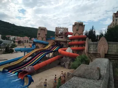 a water slide in a water park with people playing at Курортен коплекс Елените,община Несебър,област Бургас in Emona