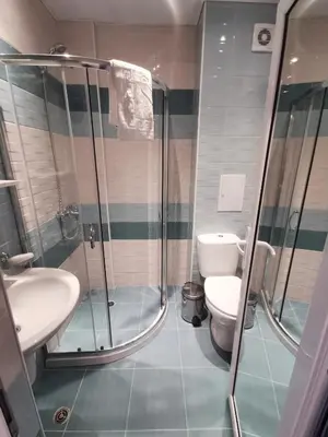 a bathroom with a shower and a toilet at Admiral Plaza Sunrise Apartments C13 in Sunny Beach
