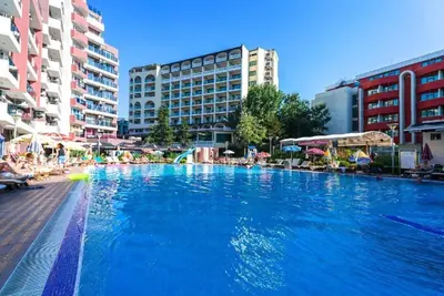 a large swimming pool in a city with buildings at Admiral Plaza Sunrise Apartments C13 in Sunny Beach