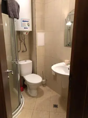 a bathroom with a toilet and a sink at Apartmán Katka, Obzor in Obzor
