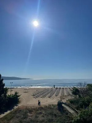 a view of a beach with the ocean in the background at Apart hotel Gallery Studio in Sunny Beach