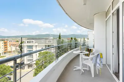 a balcony with a view of a city at PERLA TUI SUNEO All inclusive in Sunny Beach
