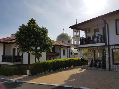 a building with a dome on the top of it at Monastery Apartment 14, St. Vlas in Sveti Vlas