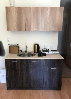 a kitchen with a sink and a counter top at Cosy, Studio Apartment At Nesebar Fort Club in Sunny Beach