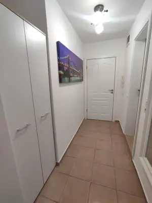 a hallway with white cabinets and a tile floor at Apartment Ferienunterkunft Strandnähe mit Pools in Sunny Beach