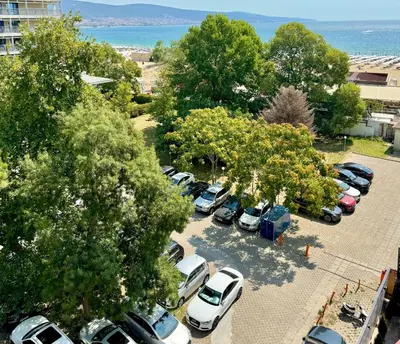 an aerial view of a parking lot with cars at Premium Apartment Midia Beach in Sunny Beach