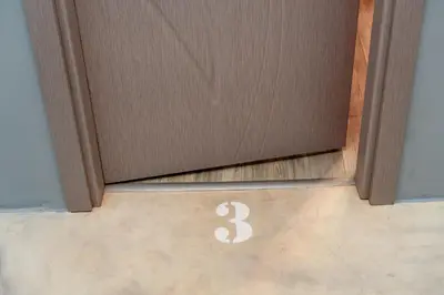 a door with the number three on the floor at ПАЦО in Burgas City