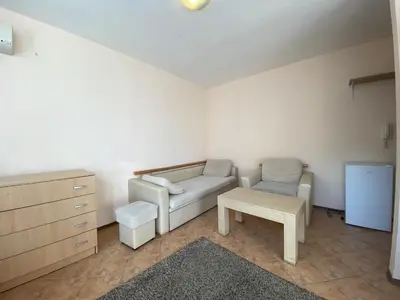 a living room with a couch and a table at BALKAN BREEZE 15 Apartment in Sunny Beach