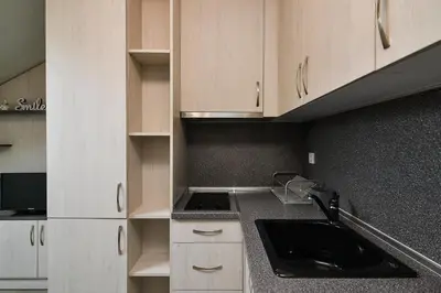 a kitchen with a sink and a counter top at Budget studio in Varna center unde roof in Varna City