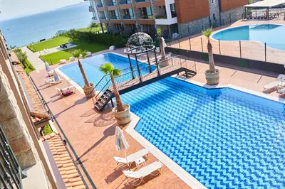 an overhead view of a swimming pool in a hotel at M1 Pool and Beach View Apartment in Burgas City