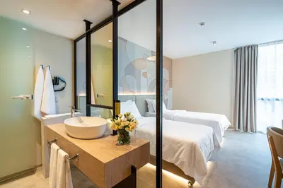 a bathroom with a sink in a hotel room at Hotel Zenith in Sunny Beach
