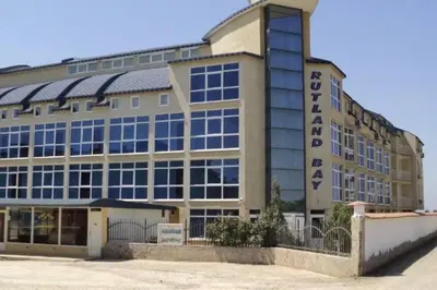 a large building with a sign on the front of it at 1 Bed Apt, Close To Ravda Beach in Ravda
