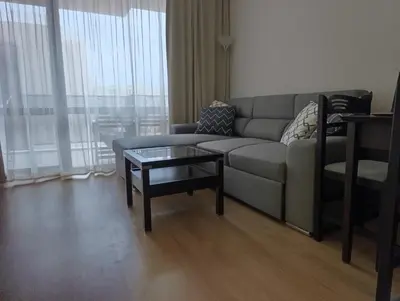 a living room with a couch and a table at Reina Apart Barcelo Beach in Sunny Beach