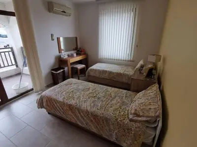 a hotel room with two beds and a mirror at Homely, 2 Bed Apt, 4* Vineyards in Kableshkovo