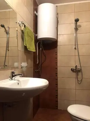 a bathroom with a sink and a toilet at Nessebar panoramic apartment in Nesebar