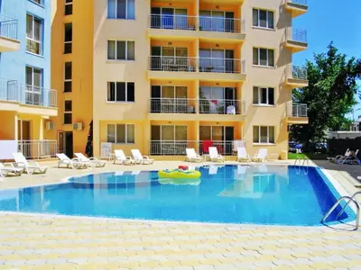 a large swimming pool in front of a building at Residence Livi Paradise Sunny Beach! 2 plus 1 - 600m away from the beach in Sunny Beach