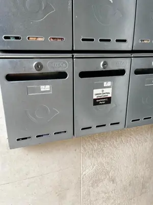 a group of ovens in a kitchen with labels on them at Green Central Apartment in Varna City